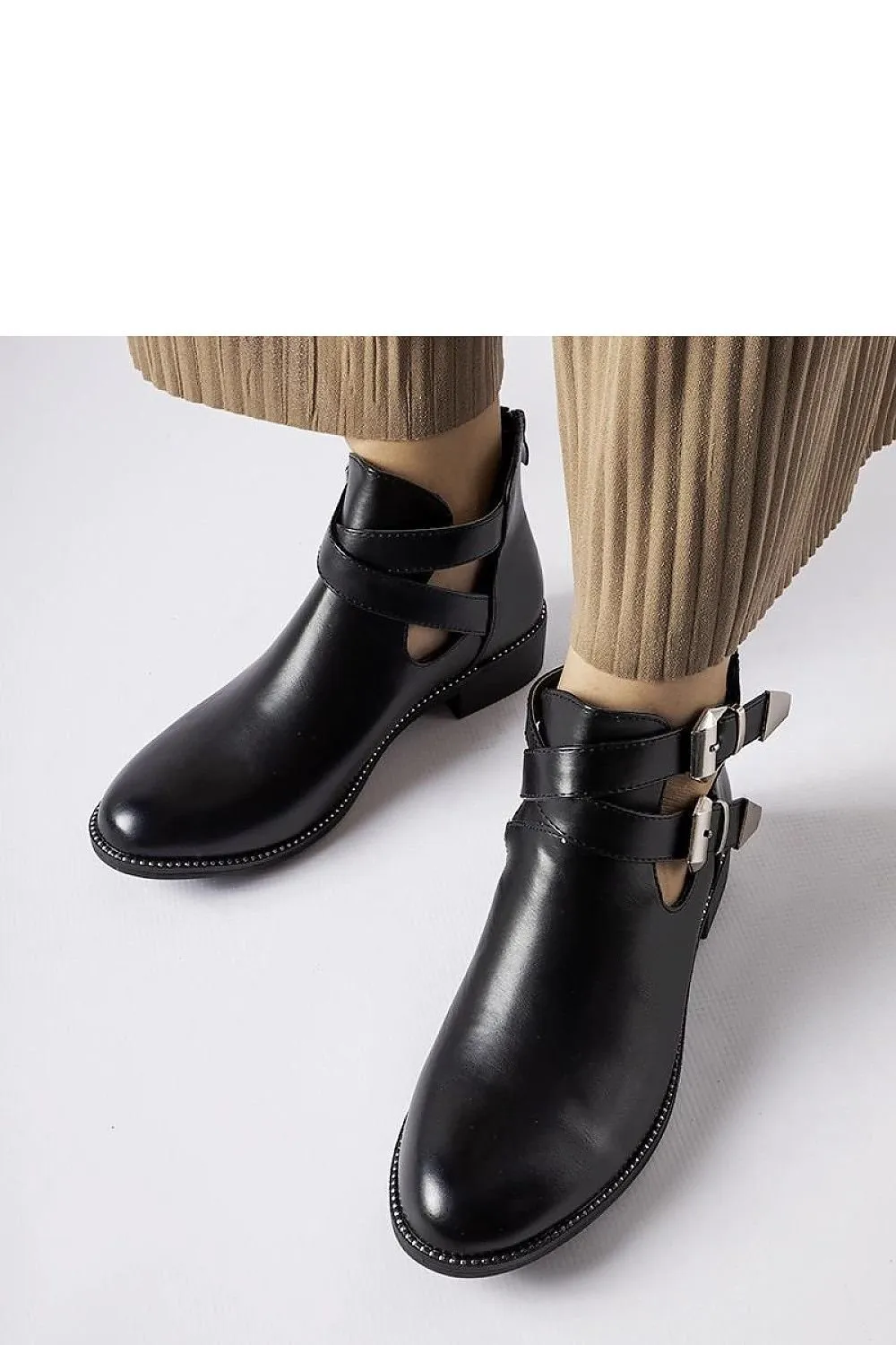 Black cut-out boots with buckles