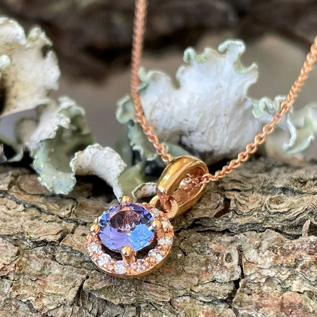 Elevated Tanzanite and Diamond Halo Pendant in Rose Gold