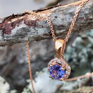 Elevated Tanzanite and Diamond Halo Pendant in Rose Gold